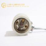 Side view showing center metal clamp and wire leads